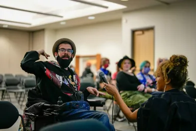 A group activity with a participant in a wheelchair fully engaged and included