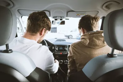 Two people sharing a relaxed journey together in a car